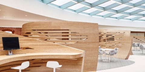 Slatted wooden 'wraps' in the Event Space, creating three separate sitting areas Slatted wooden 'wraps' in the Event Space, creating three separate sitting areas